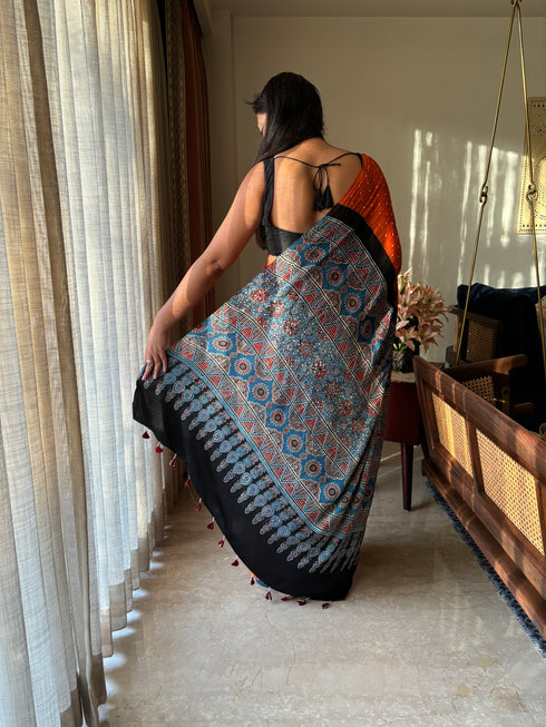 Kesar Kinara Bandhej Modal Silk Ajrakh Saree