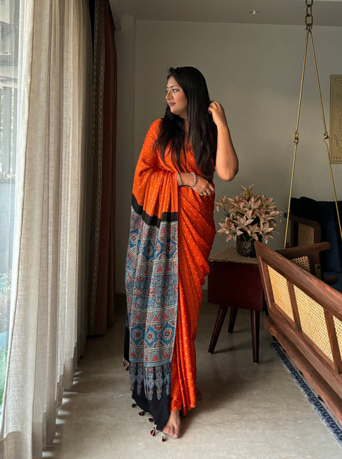 Kesar Kinara Bandhej Modal Silk Ajrakh Saree