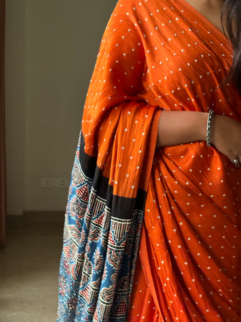 Kesar Kinara Bandhej Modal Silk Ajrakh Saree