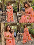 Woman in a peach saree with colorful patterns in an outdoor setting